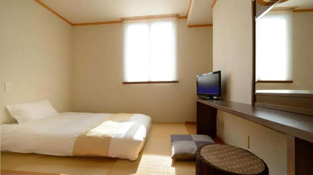 Bed in Hotel New Palace Aizuwakamatsu