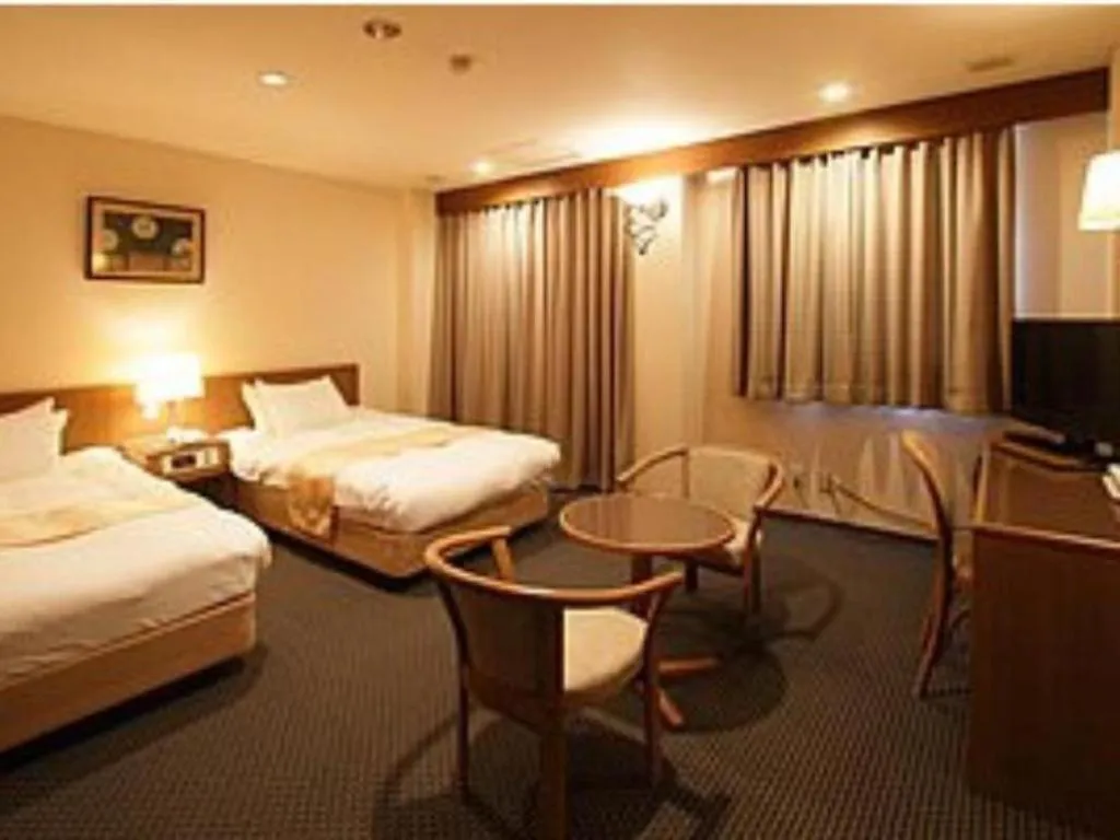 Bed in Hotel New Palace Aizuwakamatsu