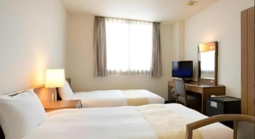 Bed in Hotel New Palace Aizuwakamatsu