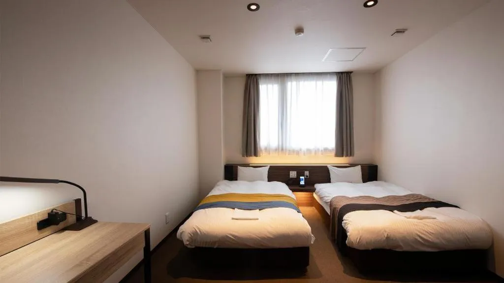 Bed in Hotel New Palace Aizuwakamatsu