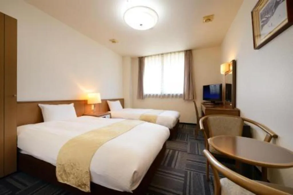 Bed in Hotel New Palace Aizuwakamatsu