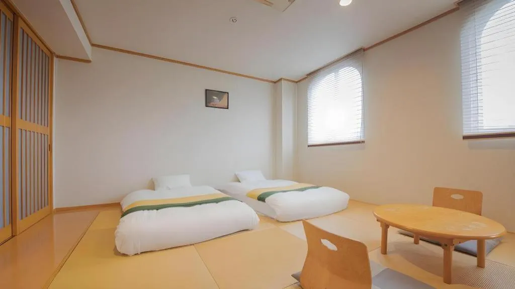 Bed in Hotel New Palace Aizuwakamatsu