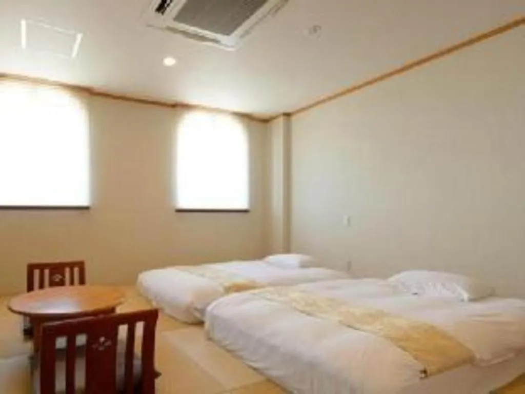 Bed in Hotel New Palace Aizuwakamatsu