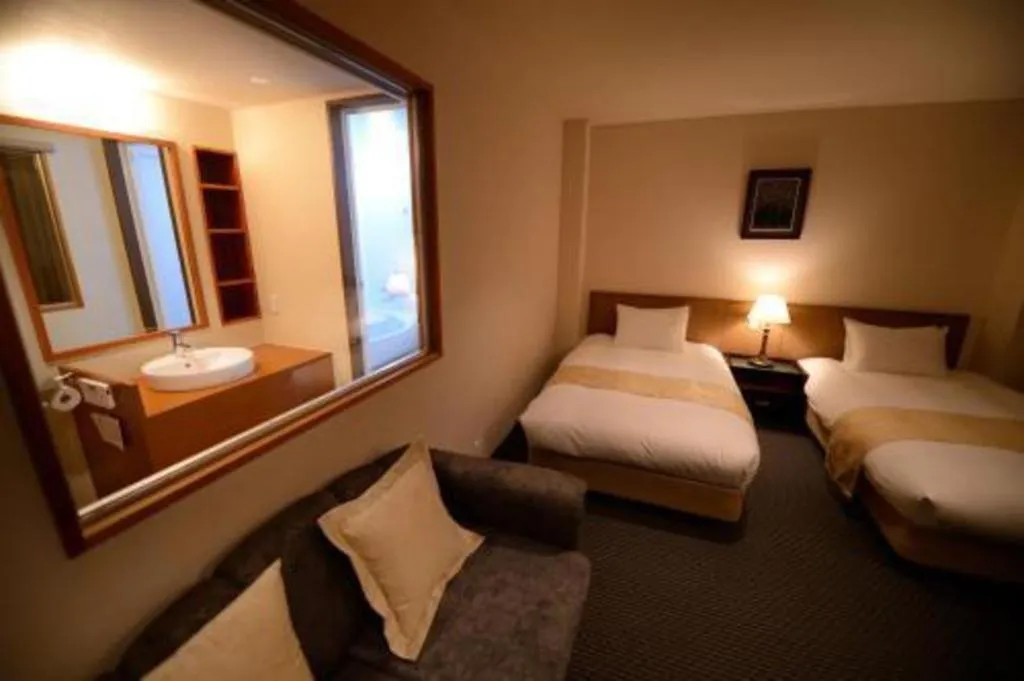 Bed in Hotel New Palace Aizuwakamatsu