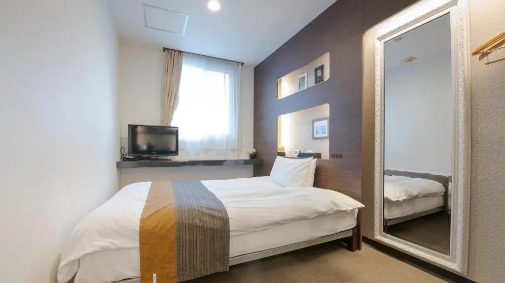 Bed in Hotel New Palace Aizuwakamatsu