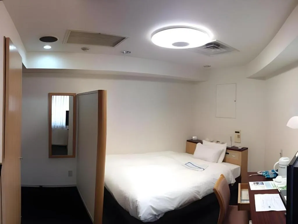 Bed in Pearl Hotel Kawasaki