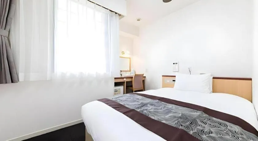 Bed in Pearl Hotel Kawasaki