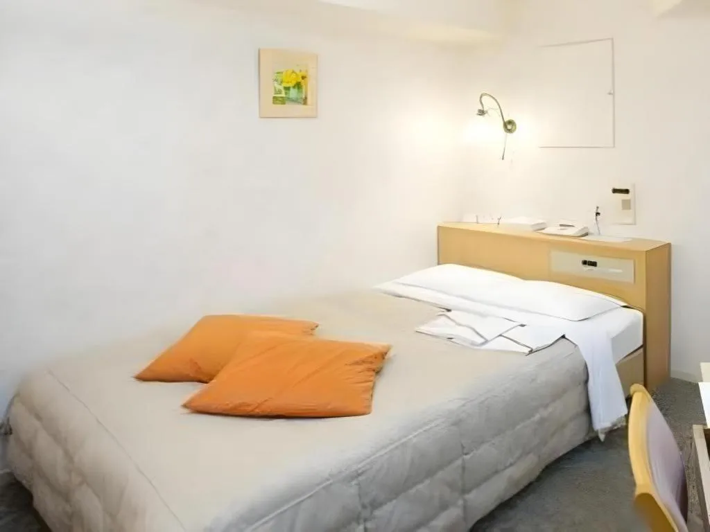 Bed in Pearl Hotel Kawasaki