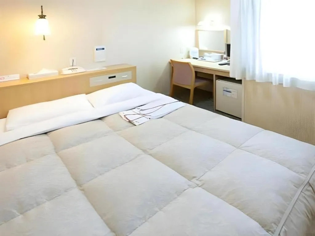 Bed in Pearl Hotel Kawasaki