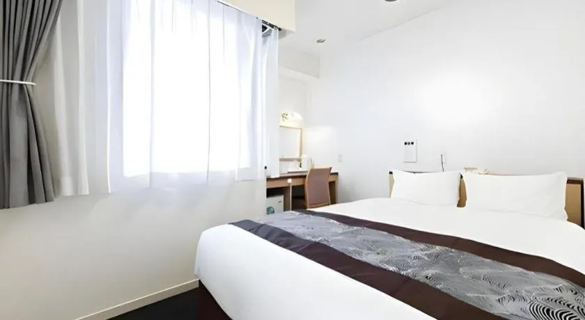 Bed in Pearl Hotel Kawasaki