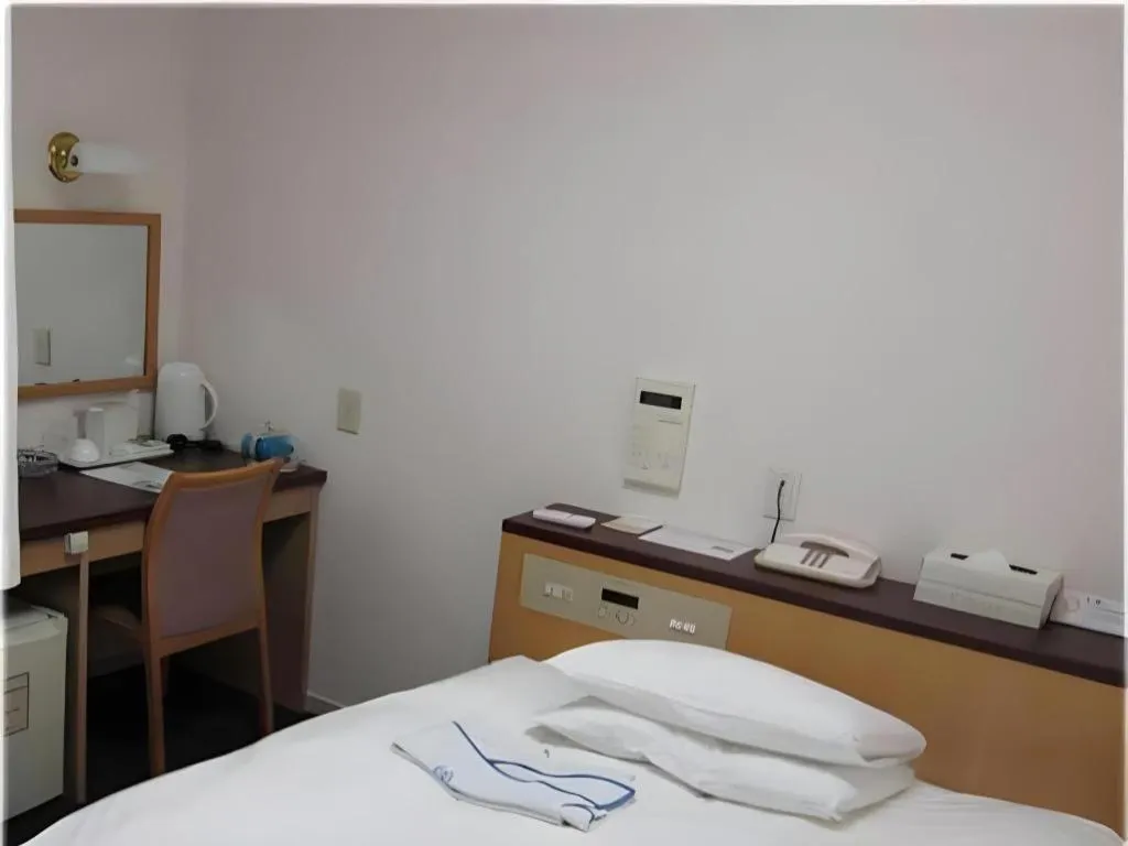 Bed in Pearl Hotel Kawasaki