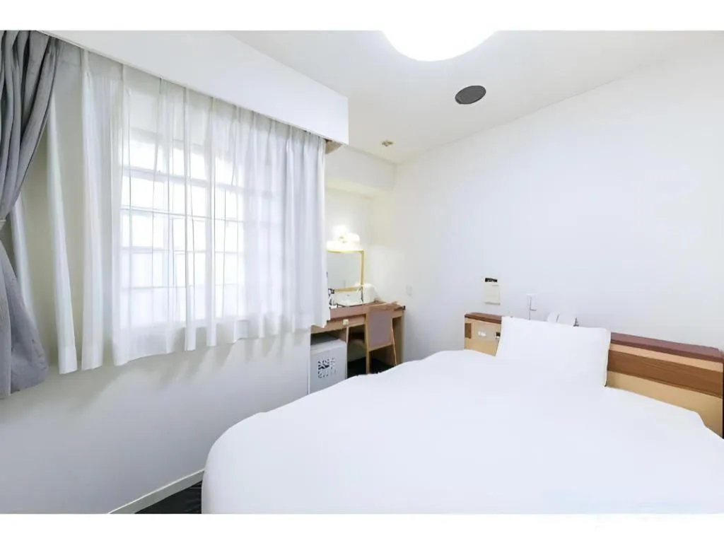 Bed in Pearl Hotel Kawasaki