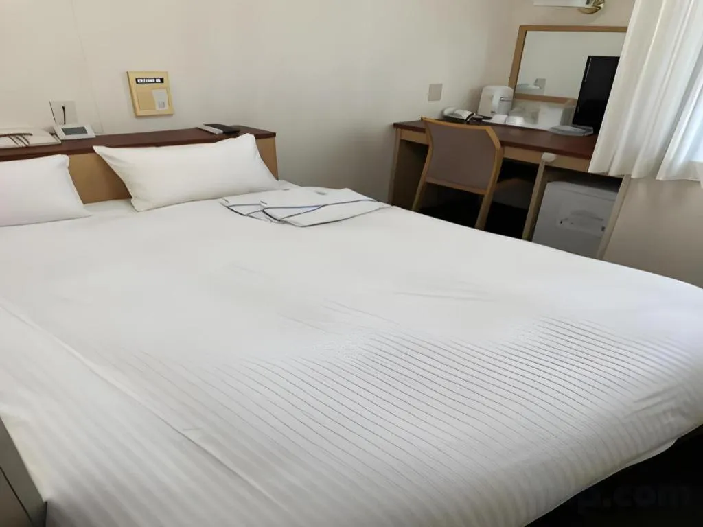 Bed in Pearl Hotel Kawasaki