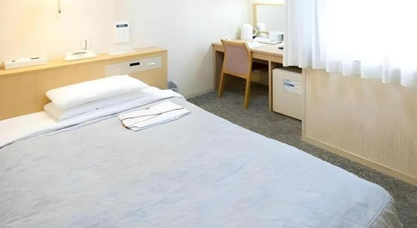 Bed in Pearl Hotel Kawasaki