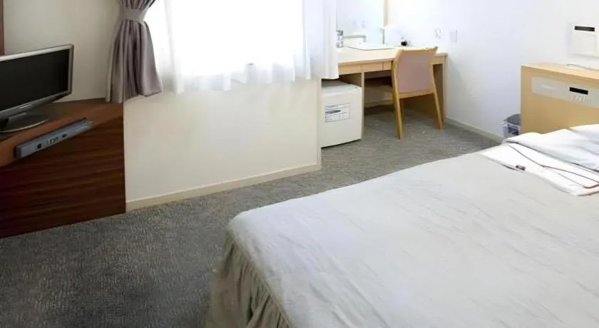 Bed in Pearl Hotel Kawasaki