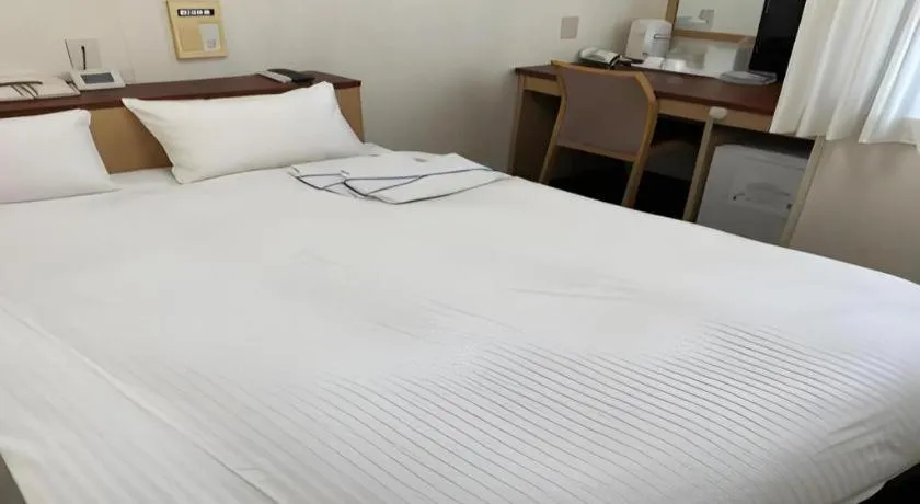 Bed in Pearl Hotel Kawasaki