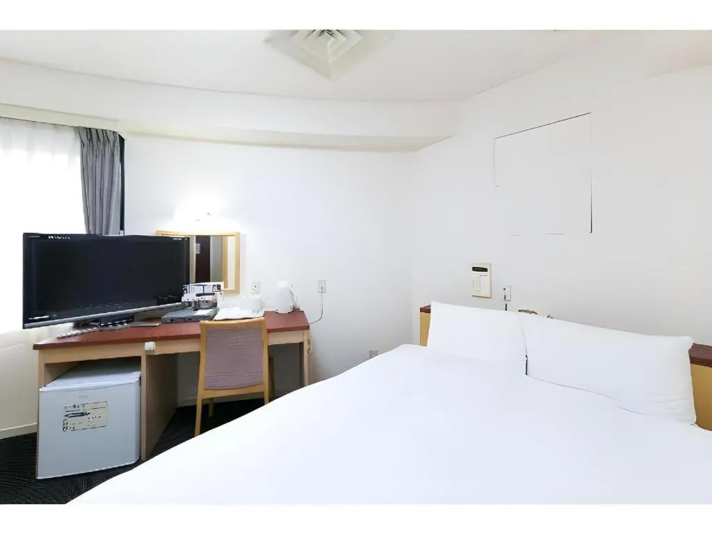 Bed in Pearl Hotel Kawasaki