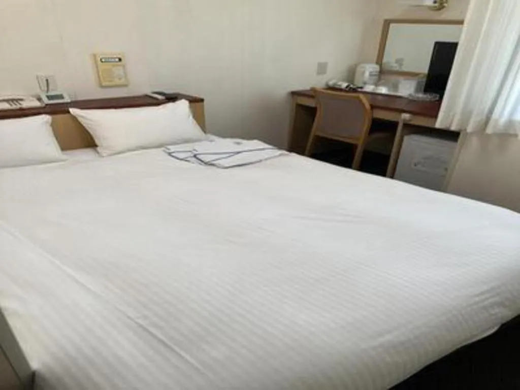 Bed in Pearl Hotel Kawasaki