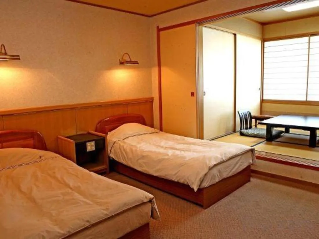 Bed in Oga Kanko Hotel