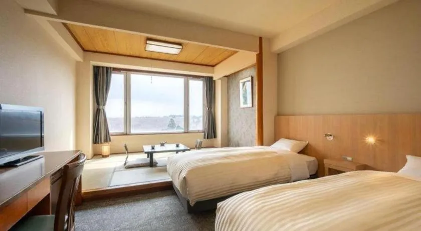 Bed in Oga Kanko Hotel