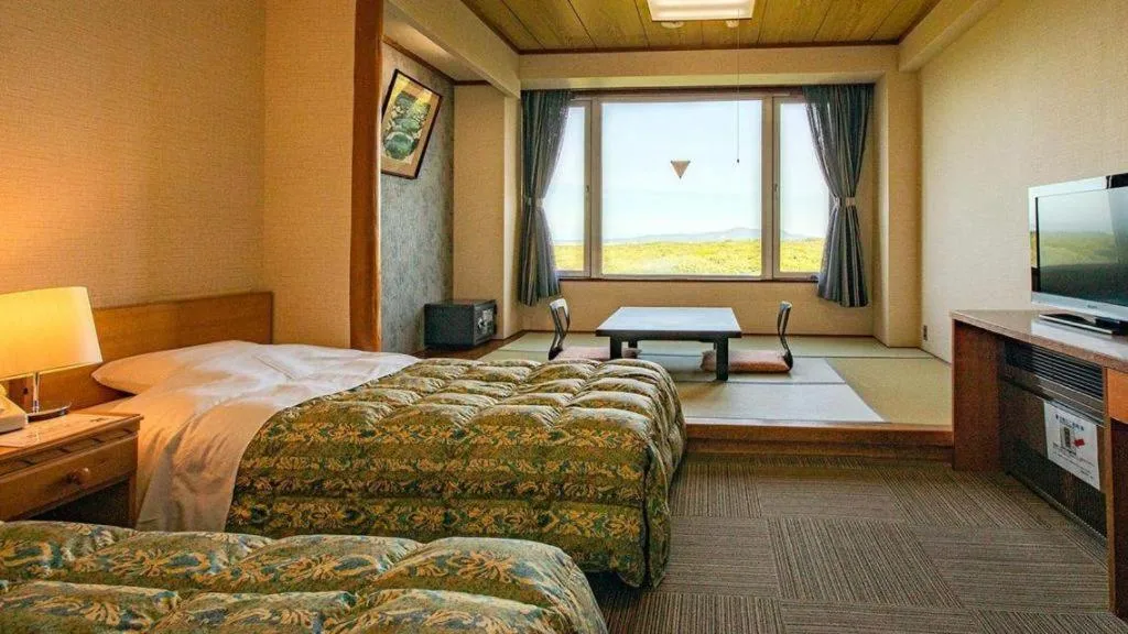 Bed in Oga Kanko Hotel