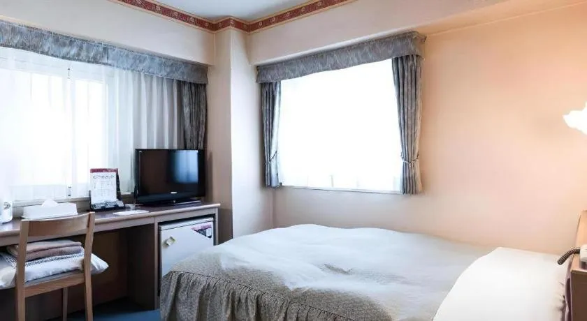 Bed in Hotel Starplaza Ikebukuro