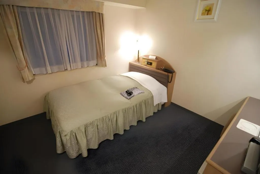 Bed in Hotel Starplaza Ikebukuro