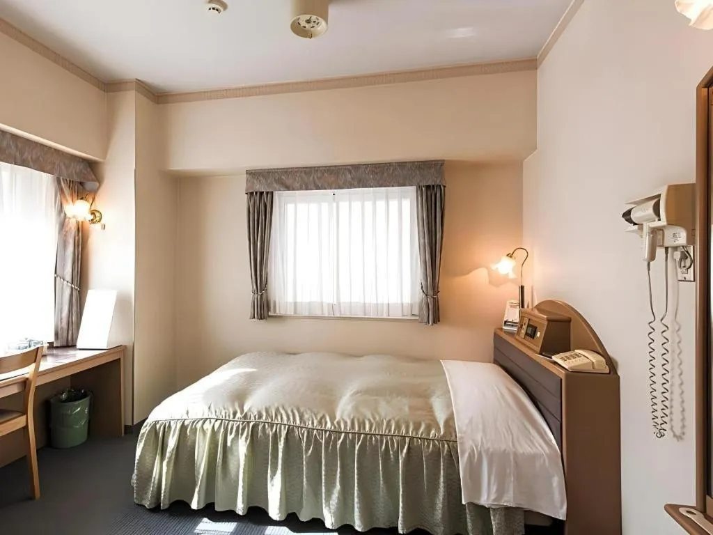 Bed in Hotel Starplaza Ikebukuro