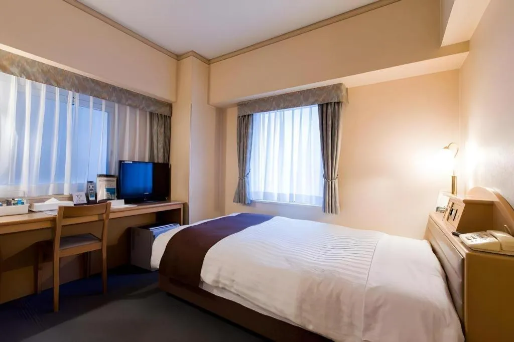 Bed in Hotel Starplaza Ikebukuro