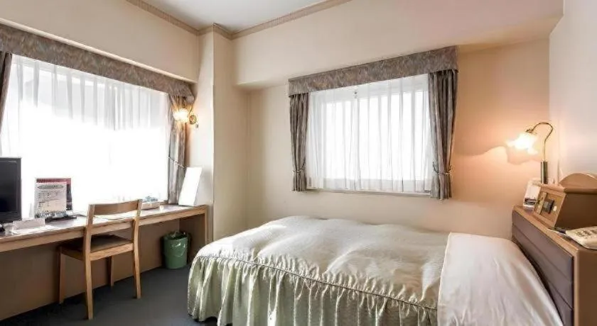 Bed in Hotel Starplaza Ikebukuro