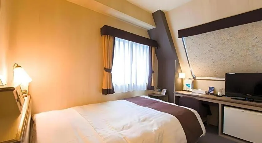 Bed in Hotel Starplaza Ikebukuro