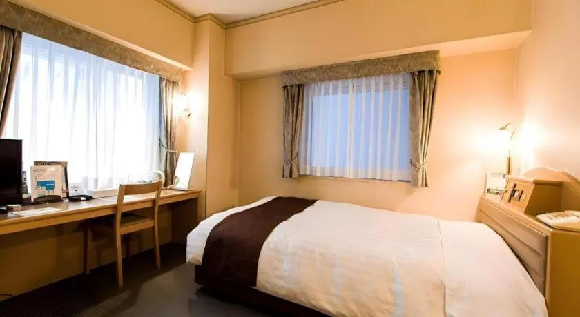 Bed in Hotel Starplaza Ikebukuro