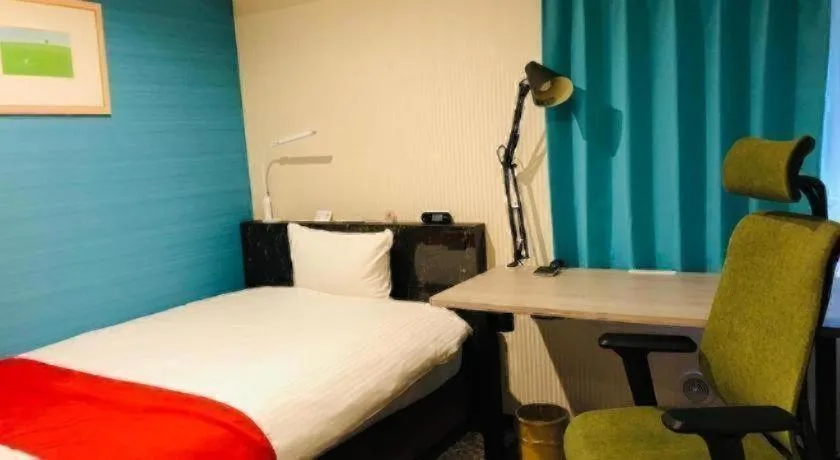 Bed in Hotel Bougainvillea Akebonobashi