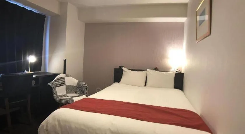 Bed in Hotel Bougainvillea Akebonobashi