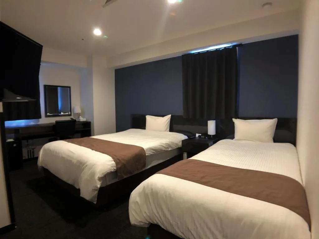 Bed in Hotel Bougainvillea Akebonobashi