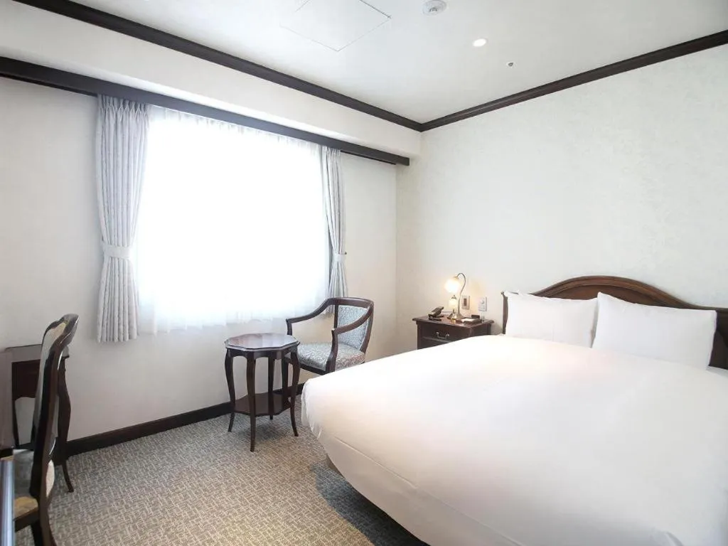 Bed in Hotel Piena Kobe