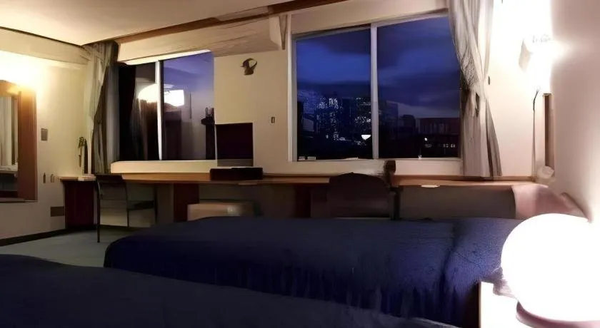 Bed in Tokyo Business Hotel