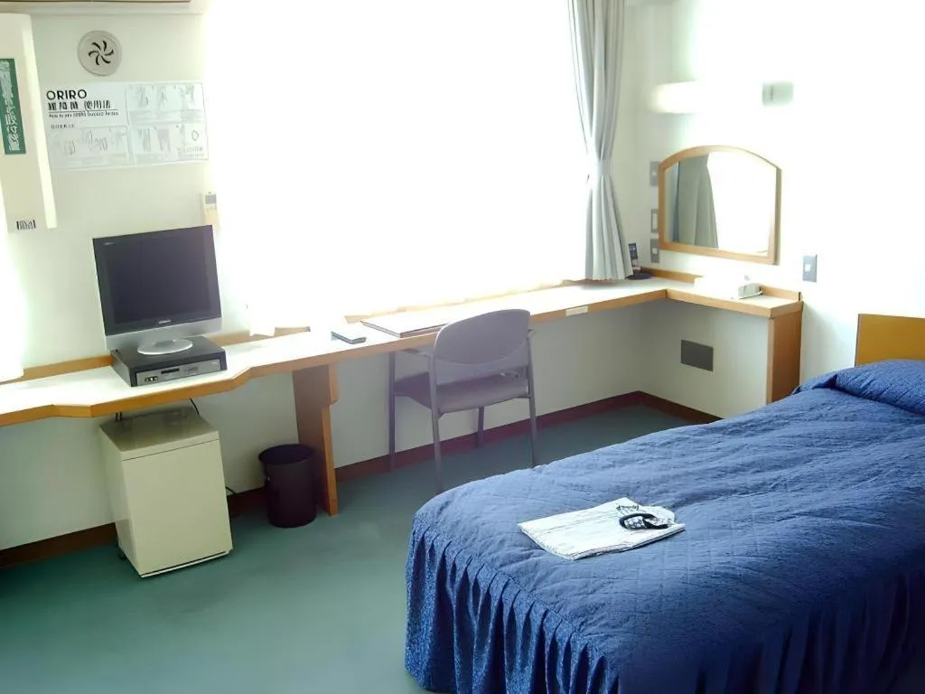 Bed in Tokyo Business Hotel