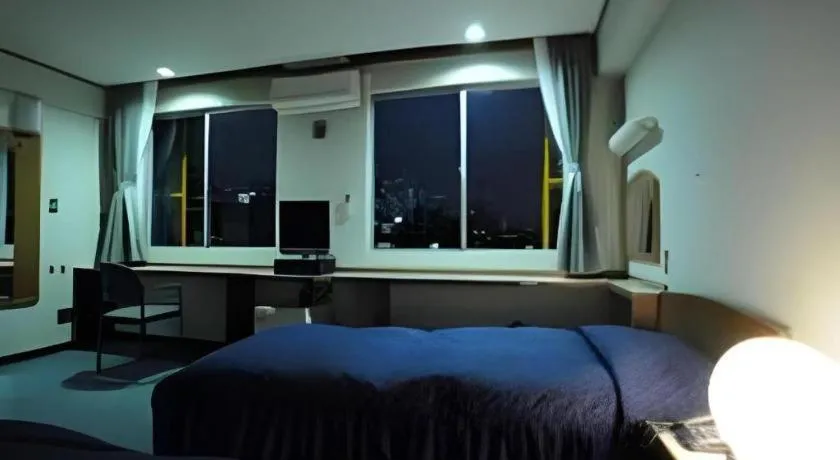 Bed in Tokyo Business Hotel