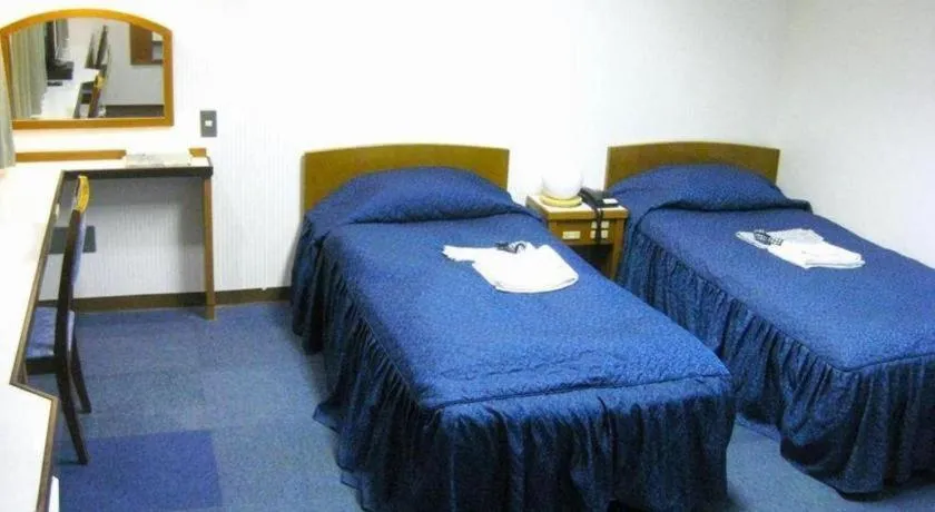 Bed in Tokyo Business Hotel