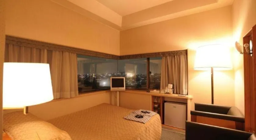 Bed in Gunma Royal Hotel