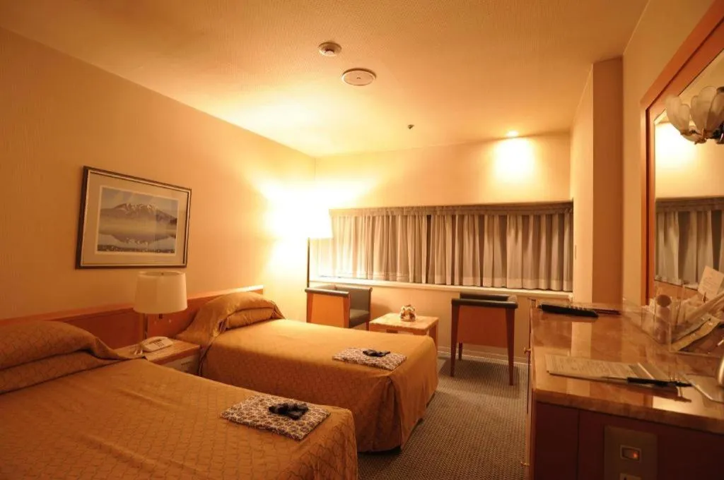 Bed in Gunma Royal Hotel