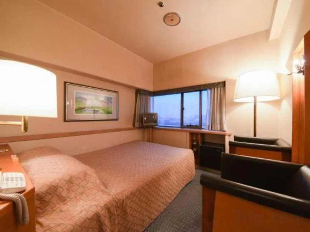 Bed in Gunma Royal Hotel