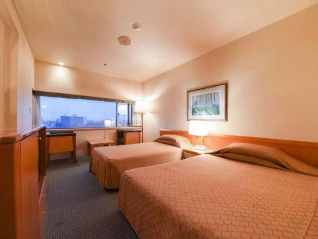 Bed in Gunma Royal Hotel