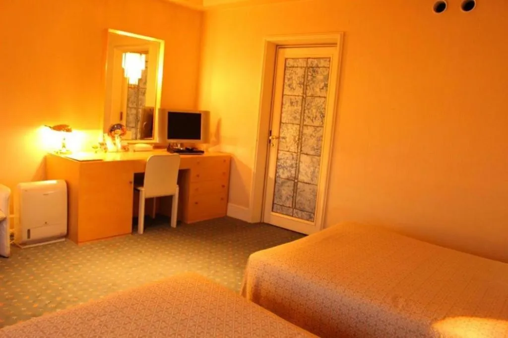 Bed in Gunma Royal Hotel