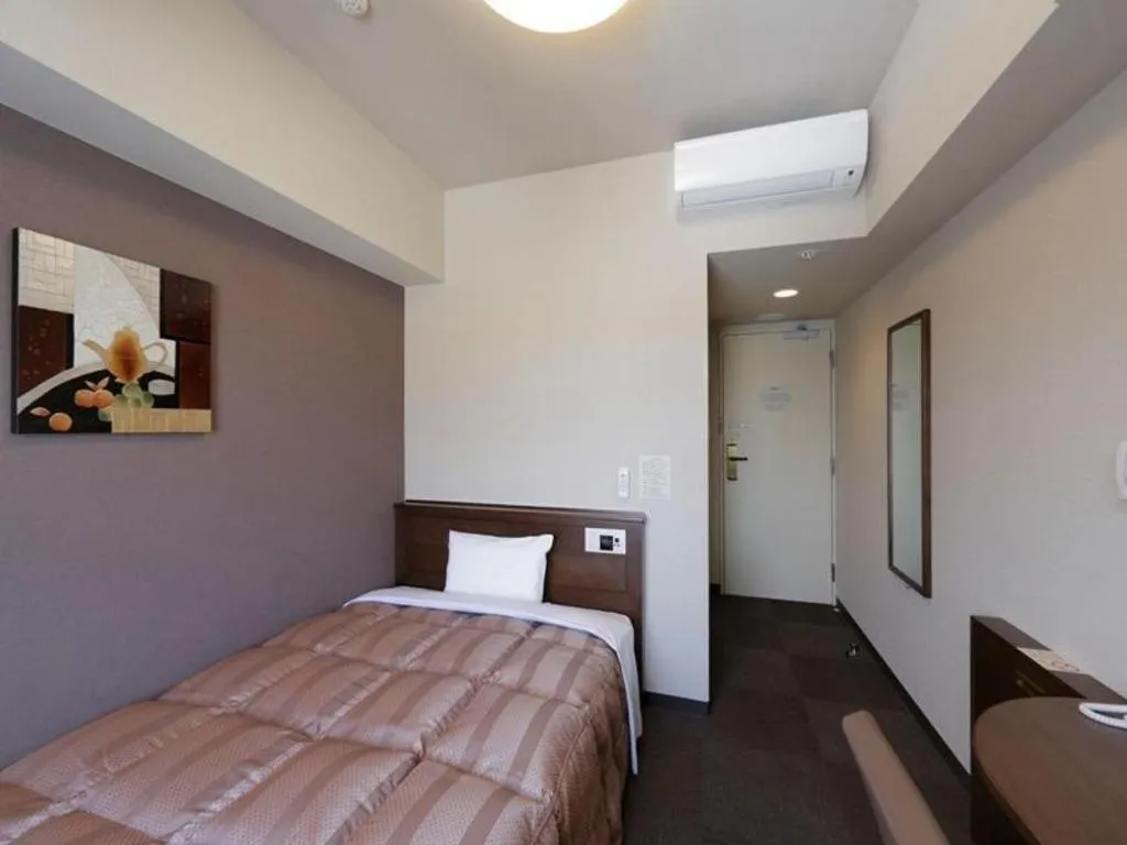 Bed in Hotel Route Inn Kitami Odori Nishi