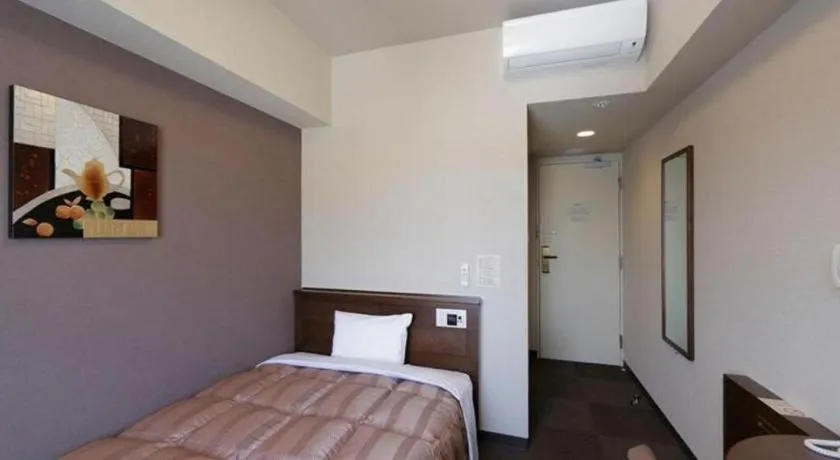 Bed in Hotel Route Inn Kitami Odori Nishi