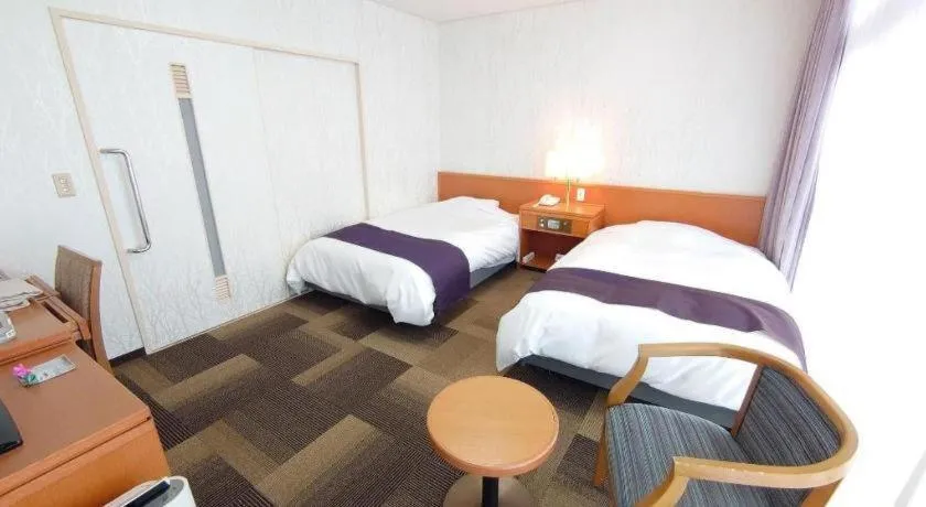 Bed in Kokura Recent Hotel