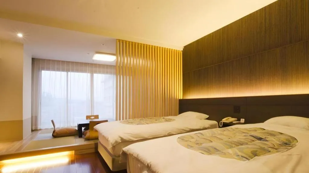 Bed in Kannawa Onsen Hotel Sansuikan