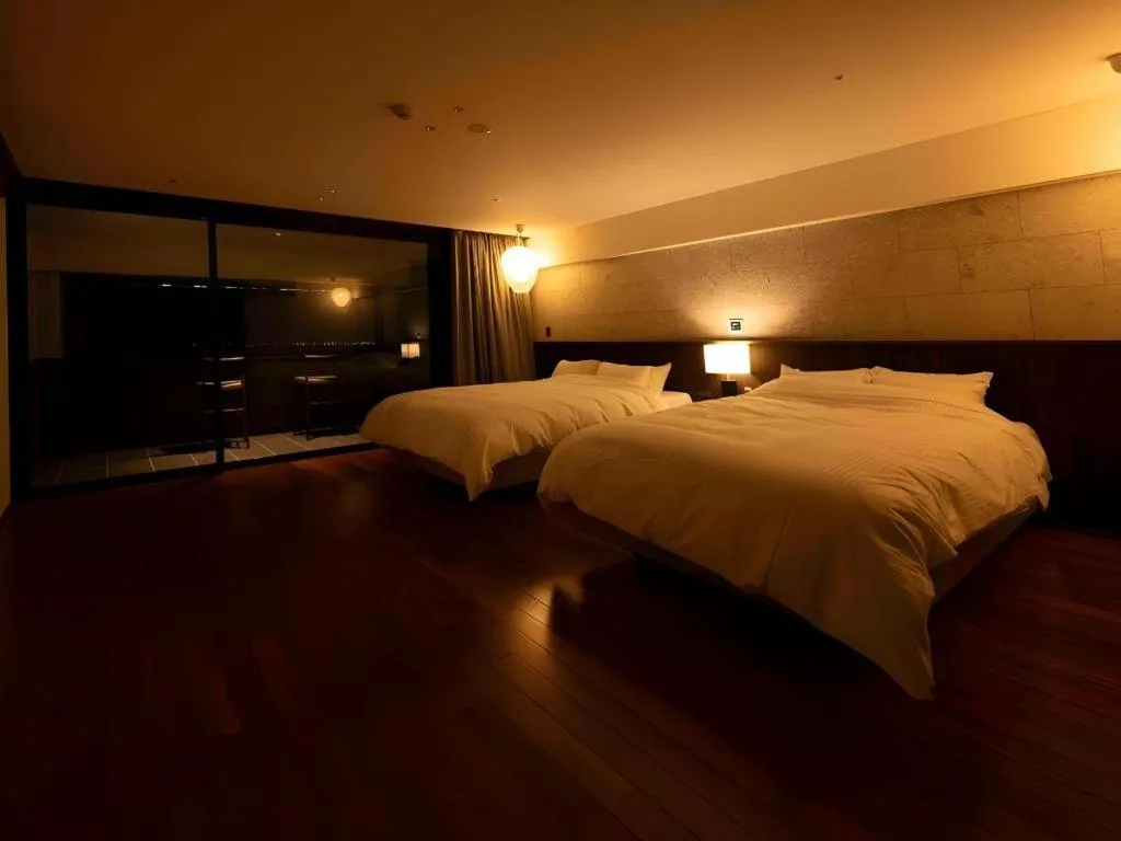 Bed in Kannawa Onsen Hotel Sansuikan